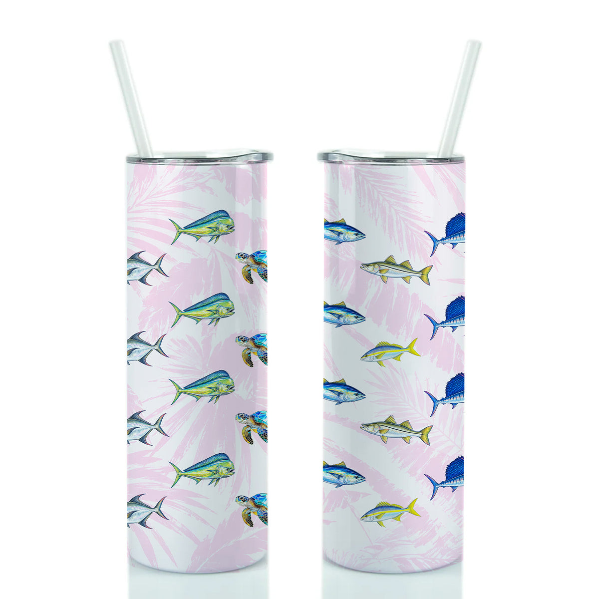 Two tall insulated tumblers with clear straws, shown side by side on a white background. The tumblers have a light pink tropical pattern featuring blue and yellow fish and white palm leaves.