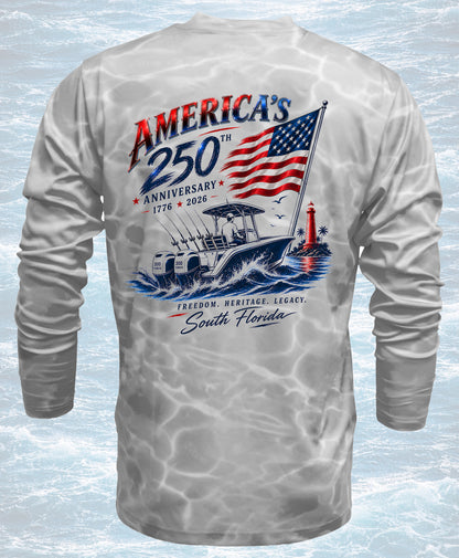 Gray long-sleeve shirt with 'America's 250th Anniversary' design featuring an American flag and boat on a water background.
