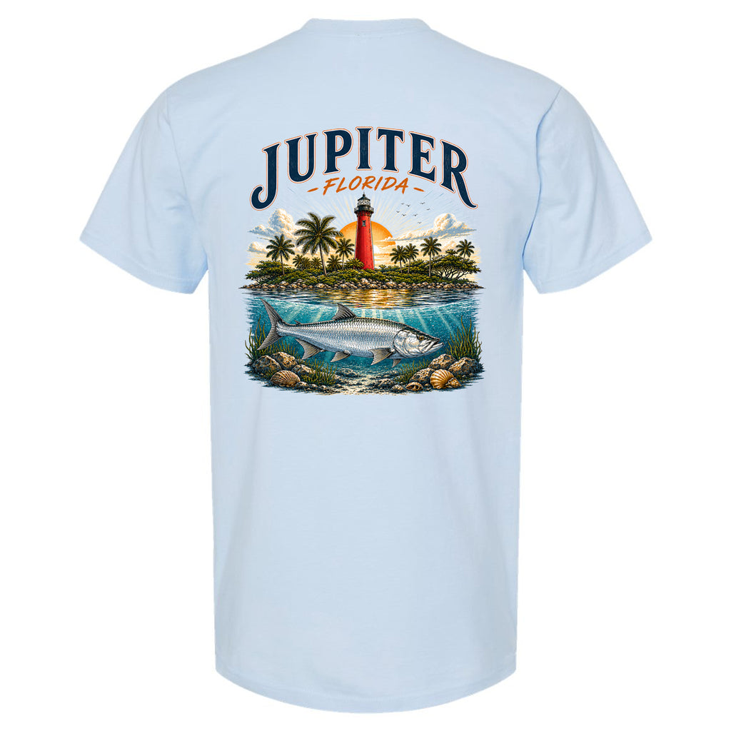 A light blue short-sleeve t-shirt shown from the back, featuring a large graphic print of 'JUPITER FLORIDA' above an illustration of a lighthouse, palm trees, water, and a fish.